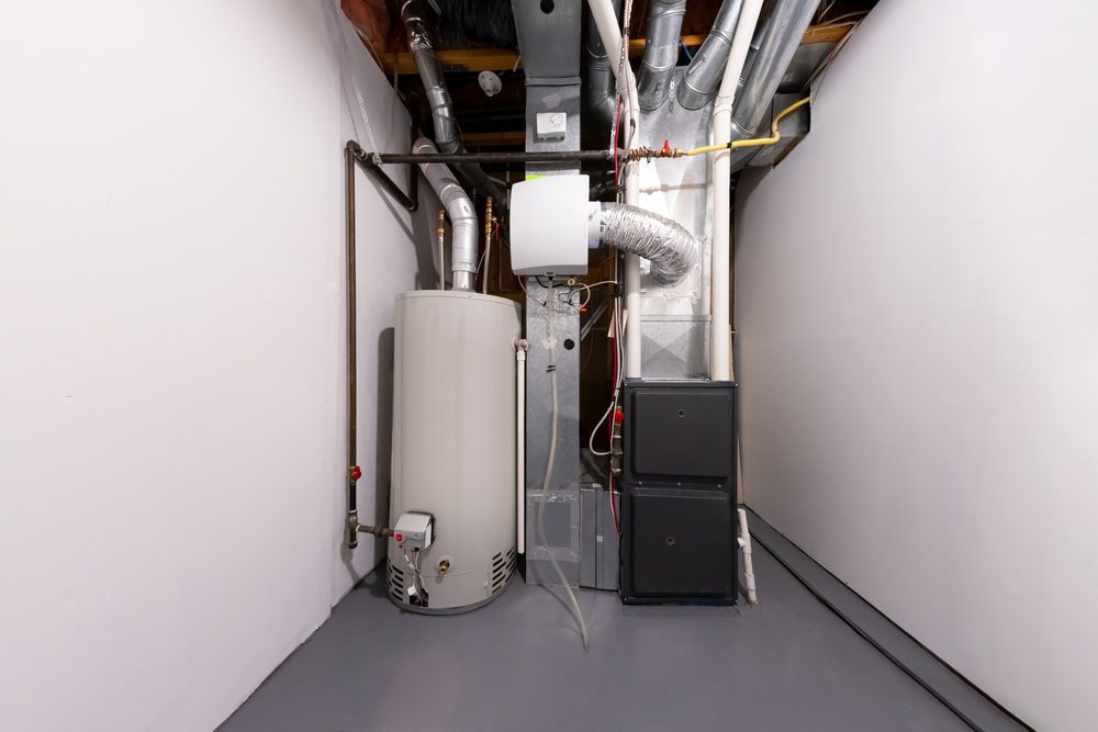 https://www.snellheatingandair.com/wp-content/uploads/Water-Heater-Knocking-Sounds-Issues-Snell-Photo.jpg